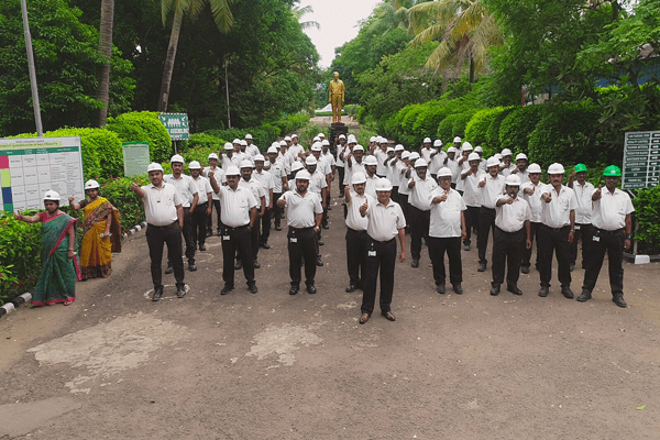 Group of people taking an oath in a green area