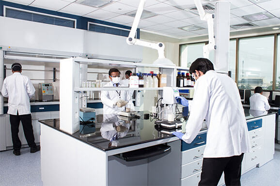 Technicians analyzing samples in a laboratory